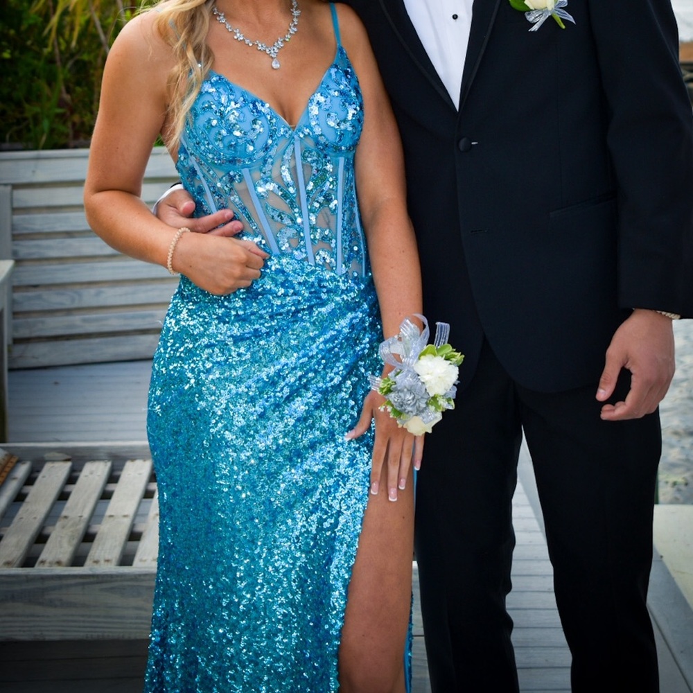 Jasz long dress, fitting top with stretchy bottom. Only worn once for prom.